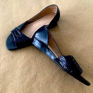Black patent leather flats size 7.
